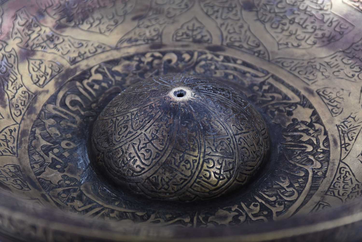 A Persian cast bronze calligraphic bowl, the interior with central raised boss, pierced at the - Image 3 of 5