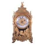 Piguet A Rennes, an early 18th century French Ormolu bracket clock, the caddy top surmounted with