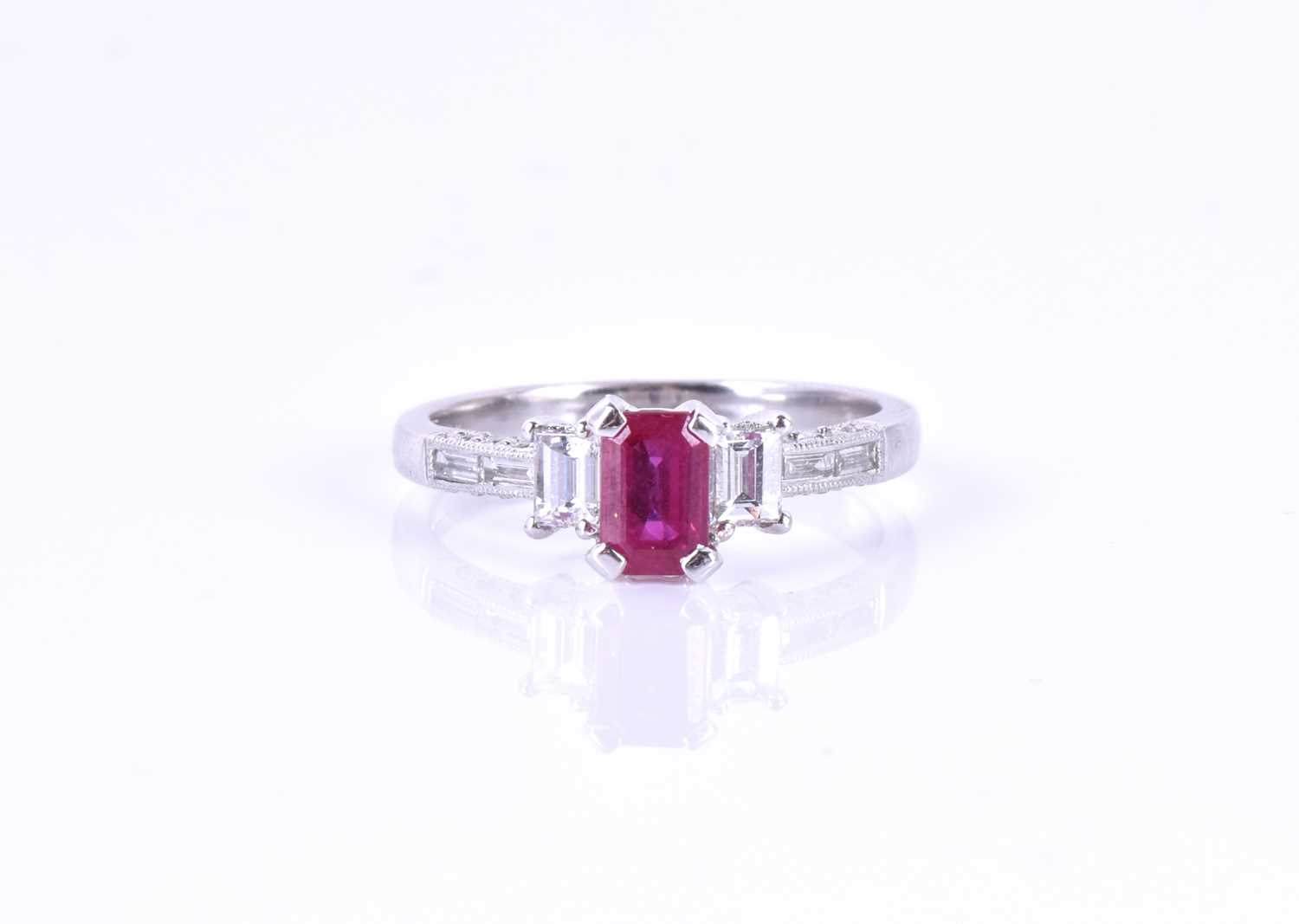 An 18ct white gold, diamond, and ruby ringin the Art Deco style, set with a mixed emerald-cut - Image 3 of 3