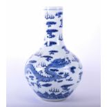 A Chinese blue and white dragon tianqiuping vase, decorated with a flaming pearl flanked by opposing