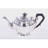 A later Victorian silver teapot Joseph Rodgers & Sons, Sheffield 1900, of lobed tapering form with