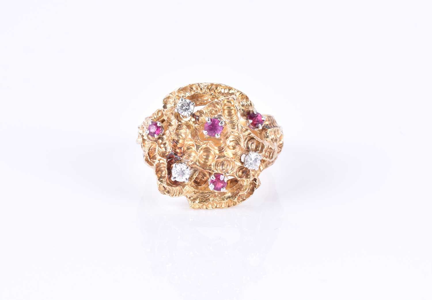 An unusual 1960s 18ct yellow gold, diamond, and ruby ringof Modernist design, the textured mount - Image 6 of 7