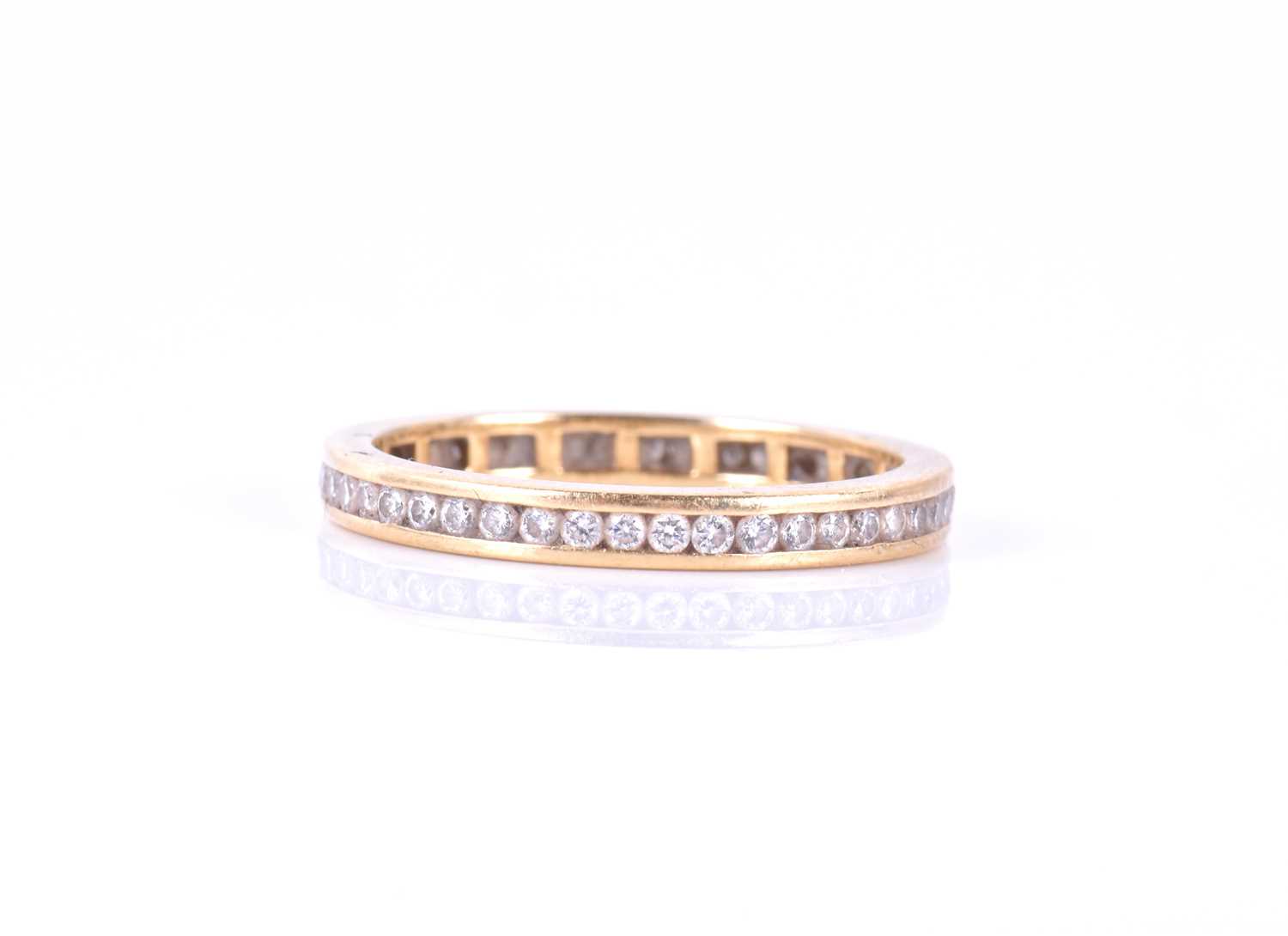 An 18ct yellow gold and diamond eternity ringset with round brilliant-cut diamonds of