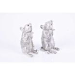 A pair of novelty white metal condimentsin the form of seated mice, 5.5 cm high.Condition report: