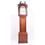 A George III oak longcase clock with broken swan neck pediment, over a painted moonphase dial, the