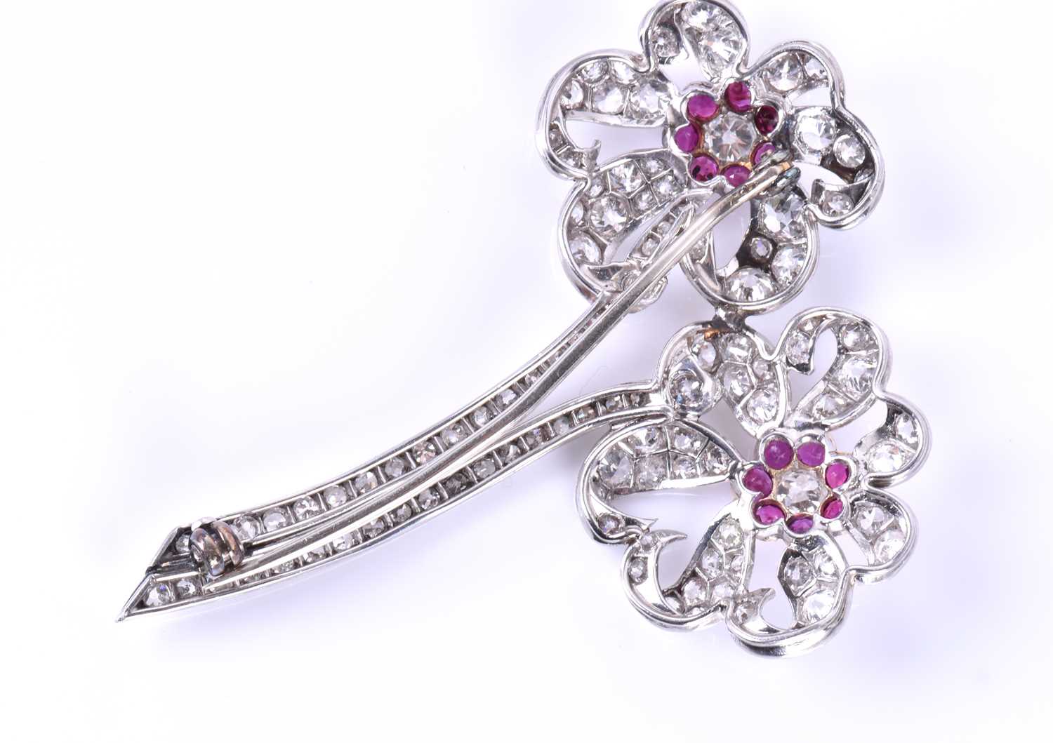 An impressive diamond and ruby floral broochcirca early to mid 20th century, each flower centred - Image 4 of 5