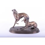 After Pierre-Jules Mene, a pair of playful greyhounds, late 20th century, bronzed resin, stamped V