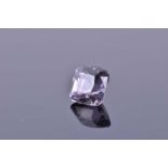 A loose square cushion-cut spinelmid to dark purple in colour, of 4.45 carats. Please note: VAT will