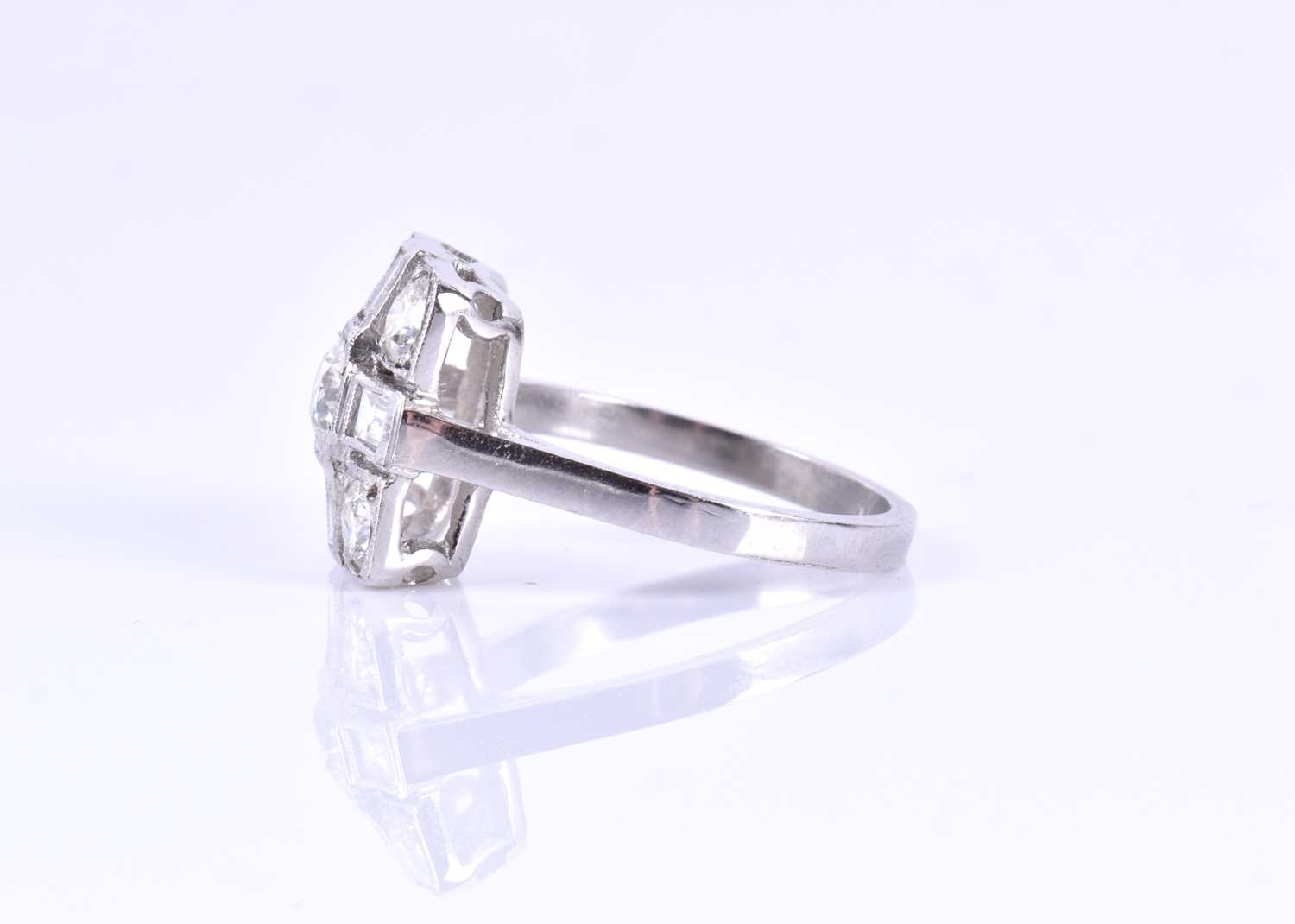 A platinum and diamond ringin the Art Deco style, set with round-brilliant and baguette-cut diamonds - Image 3 of 3