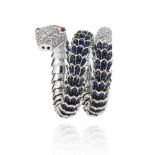 Frost of London. An 18ct White Gold Diamond & Sapphire Snake Ring, set with 2.92 carats of blue