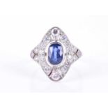 An 18ct yellow gold, diamond, and sapphire ringin the Art Deco style, the marquise-shaped mount