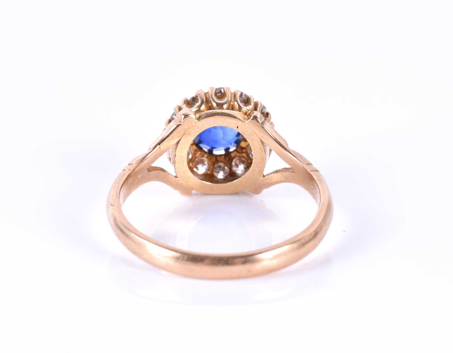 A yellow metal, diamond and sapphire cluster ringset with a mixed round-cut sapphire, measuring - Image 2 of 3