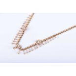 A Victorian 15ct yellow ogld and pearl choker necklacethe articulated segments each bar set with a