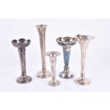 A group of five silver posy vases including one, Sheffield 1906, by James Dixon & Sons, 14 cm