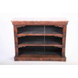 A Regency rosewood marble-topped open bookcase with carved border decoration and scroll corners,