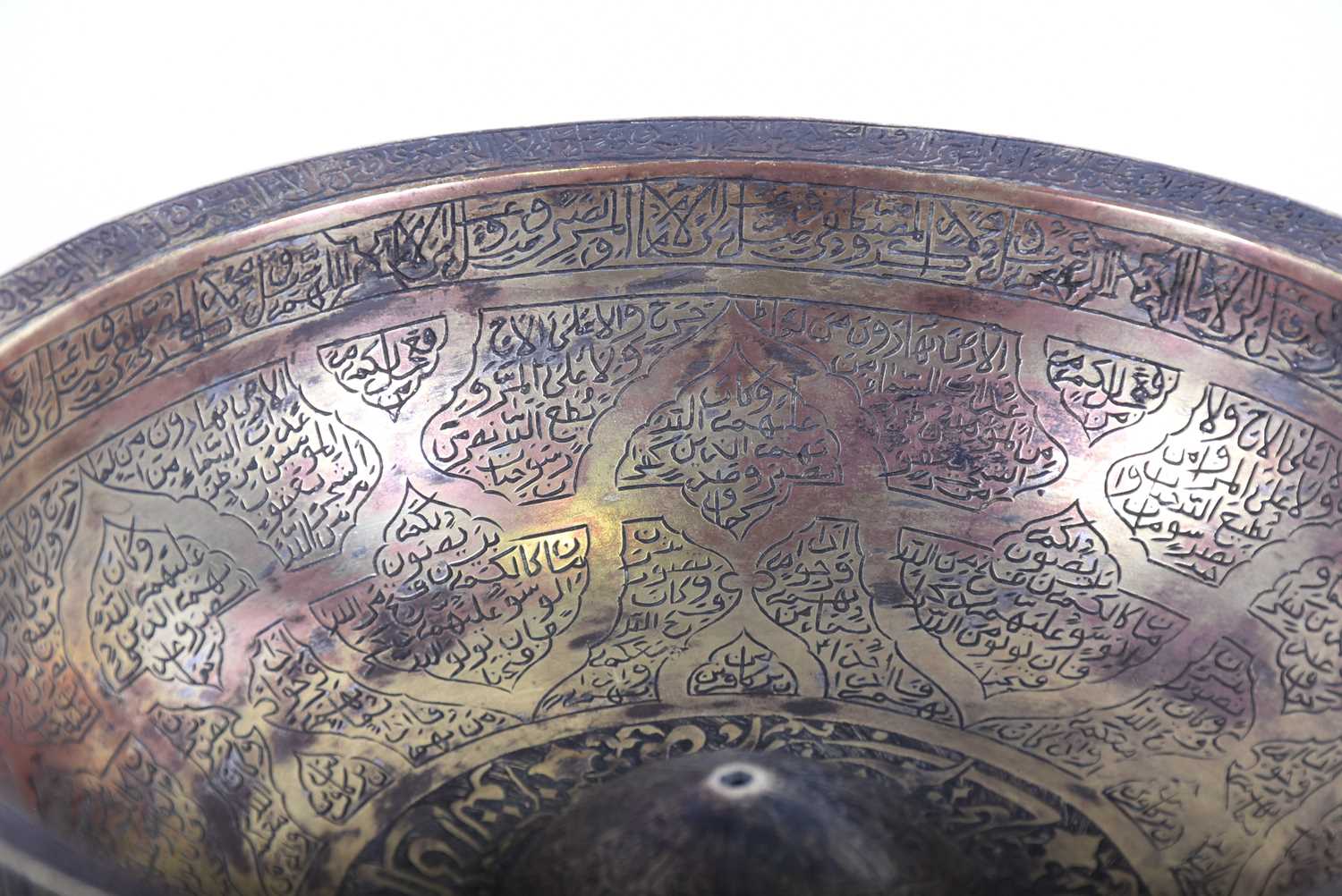 A Persian cast bronze calligraphic bowl, the interior with central raised boss, pierced at the - Image 4 of 5