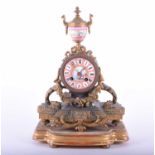 A French gilt metal and porcelain mantel clock, late 19th century, with Japy Freres two train