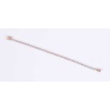 A rose gold and diamond line braceleteach bezel-set round brilliant-cut diamond of approximately 0.