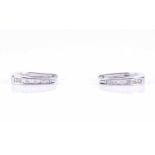 A pair of 14ct white gold and diamond hoop earringschannel-set with alternating round brilliant-