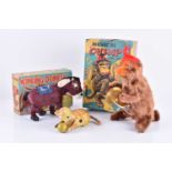 A novelty 'Winking Donkey' toyin original box, together with a 'Musical Chimp' in original box,