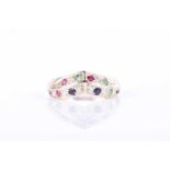 A yellow metal, diamond, and gemstone wishbone ringthe mount inset with round-cut diamonds,