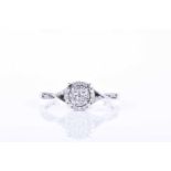 A white gold and diamond circular cluster ringset with a cluster of round brilliant-cut diamonds,