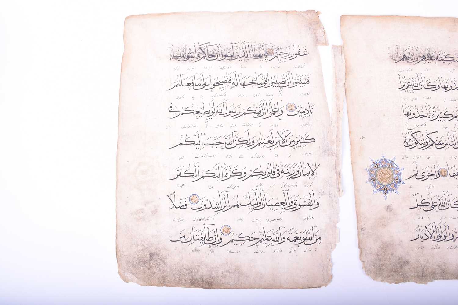 Two leaves of Persian script, 18th century, each with illuminated roundels, 40.5cm x 31cmCondition - Image 7 of 18