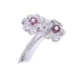 An impressive diamond and ruby floral broochcirca early to mid 20th century, each flower centred