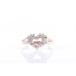 A 14k rose gold and diamond heart-shaped ringset with round brilliant-cut diamonds, the heart 1.2 cm