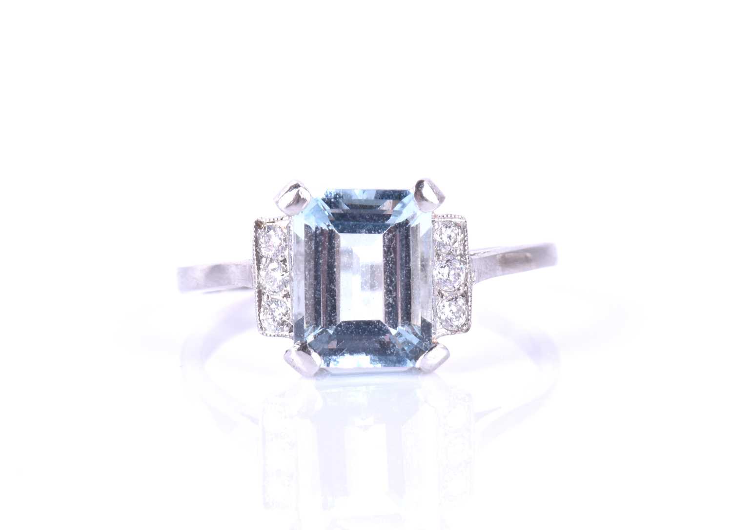 A platinum, diamond, and aquamarine ringset with an emerald-cut aquamarine of approximately 2.20