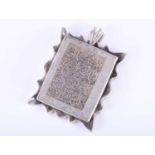 A Persian silver and white quartz pendantof rectangular form, the rock crystal plaque with