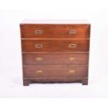 A 19th century style campaign secretaire chest with brass mounts, the top drawer with drop flap