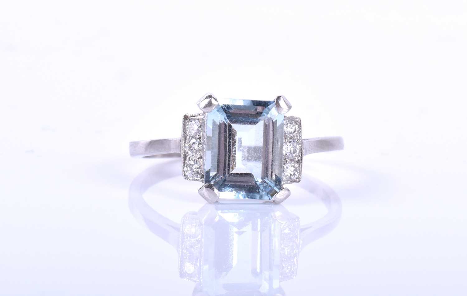 A platinum, diamond, and aquamarine ringset with an emerald-cut aquamarine of approximately 2.20 - Image 2 of 4