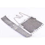 A white metal mesh link ladies belt the mesh of geometric design, together with a white metal ladies