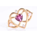 An 18ct yellow gold, diamond, pearl, and pink gemstone broochin the Art Nouveau style, centred