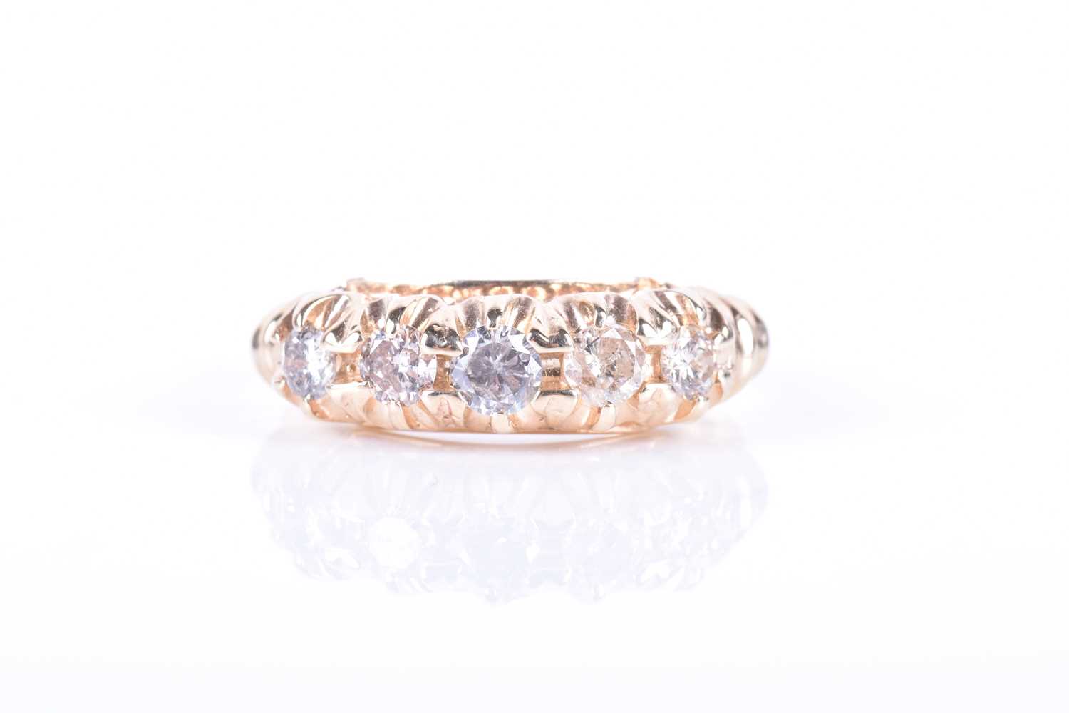 A yellow metal and five stone diamond ringset with five round-cut diamonds of approximately 0.45