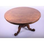 An early Victorian Rosewood breakfast table,the well figured circular top upon a turned column