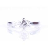 An 18ct white gold and solitaire diamond ringset with a round brilliant-cut diamond of approximately