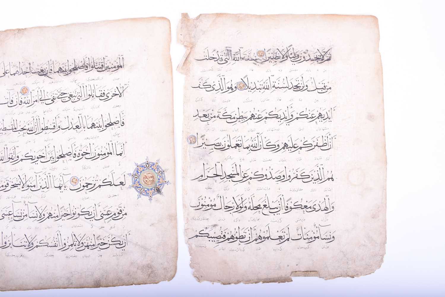 Two leaves of Persian script, 18th century, each with illuminated roundels, 40.5cm x 31cmCondition - Image 5 of 18