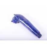 An Indian care lapis lazuli dagger handle, the pommel carved as a lions head, 9.7cmCondition report: