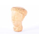 A carved ivory monks head, 18th/early 19th century, with tonsured head, possibly Spanish, 6.5cm