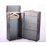 An American 'Oshkosh' steamer/cabin trunk early 20th century, the fitted interior of drawers and