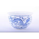 A Chinese blue and white bowl, 20th century, with everted rim above the body painted with a