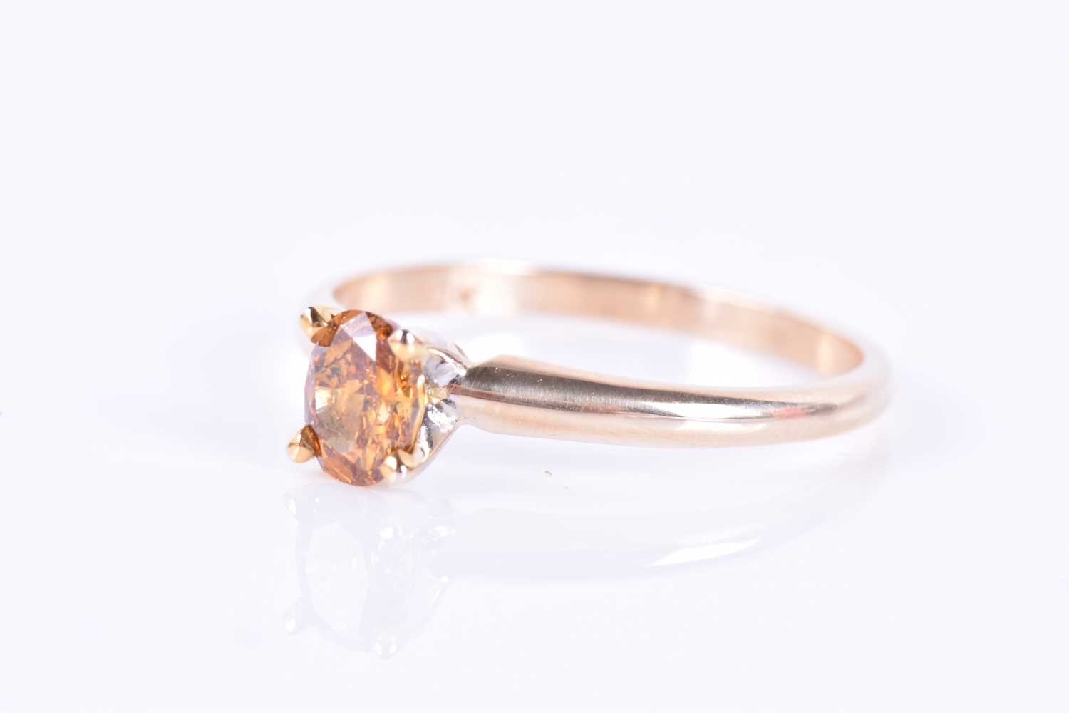 A 14k yellow gold and solitaire diamond ringset with a 0.45 carat fancy deep orange mixed oval-cut - Image 2 of 4