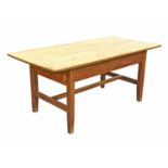A 19th century pine single drawer kitchen table on plain, tapering legs united by cross stretcher.79