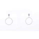 A pair of 14k white gold and diamond hoop earringseach set with an open hoop pendant inset with