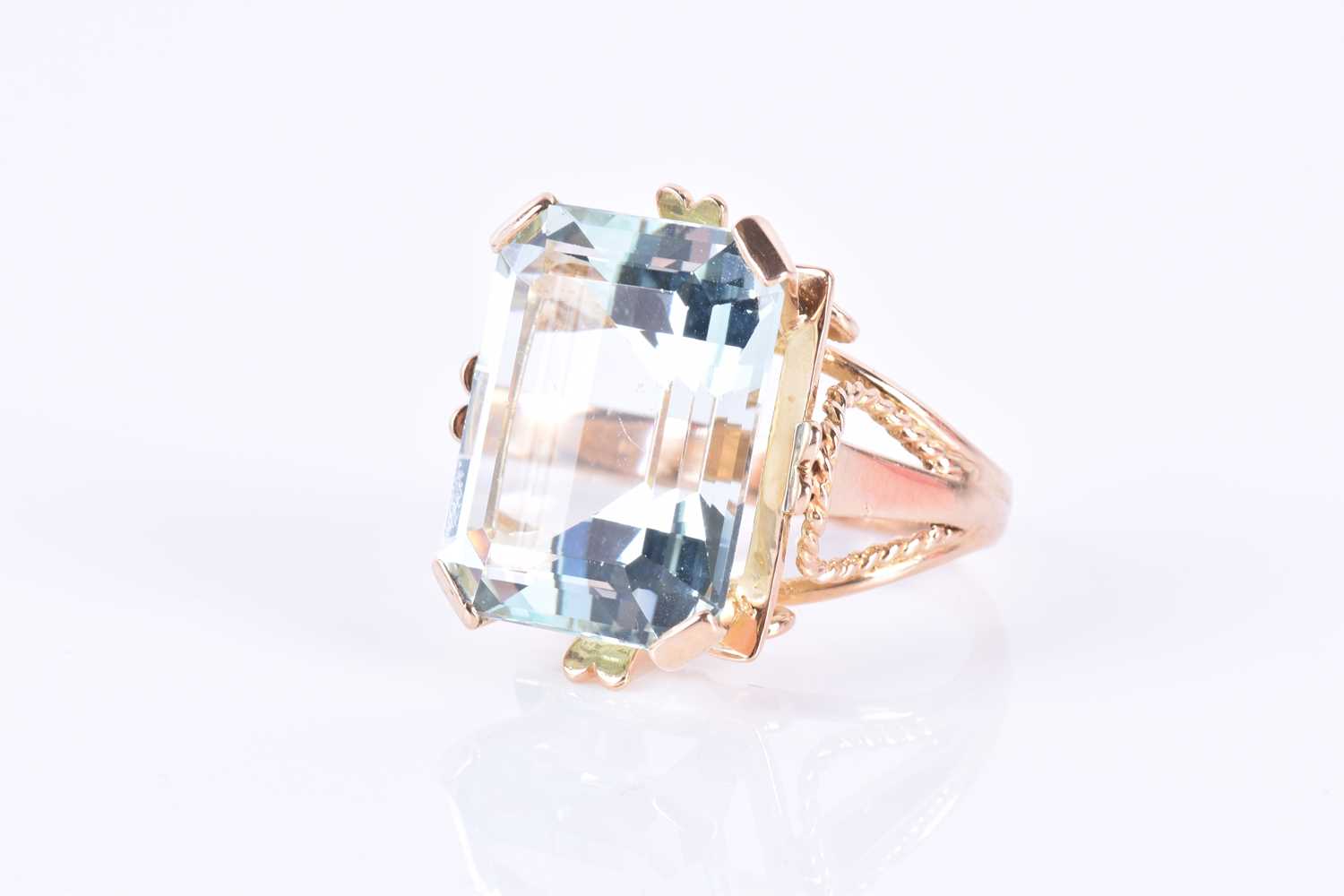 A yellow gold and aquamarine cocktail ringset with a large emerald-cut aquamarine of approximately - Image 3 of 3