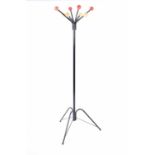 A vintage atomic style hat and coat stand The black stem terminating in red and yellow spheres, on
