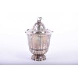 A Georg Jensen silver pot & cover, circa 1920, the lid with leaf and berry finial above cast leaves,