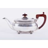 A George V silver teapot B&W Ltd, Birmingham 1931, the compressed oval body with gadrooned rim, on